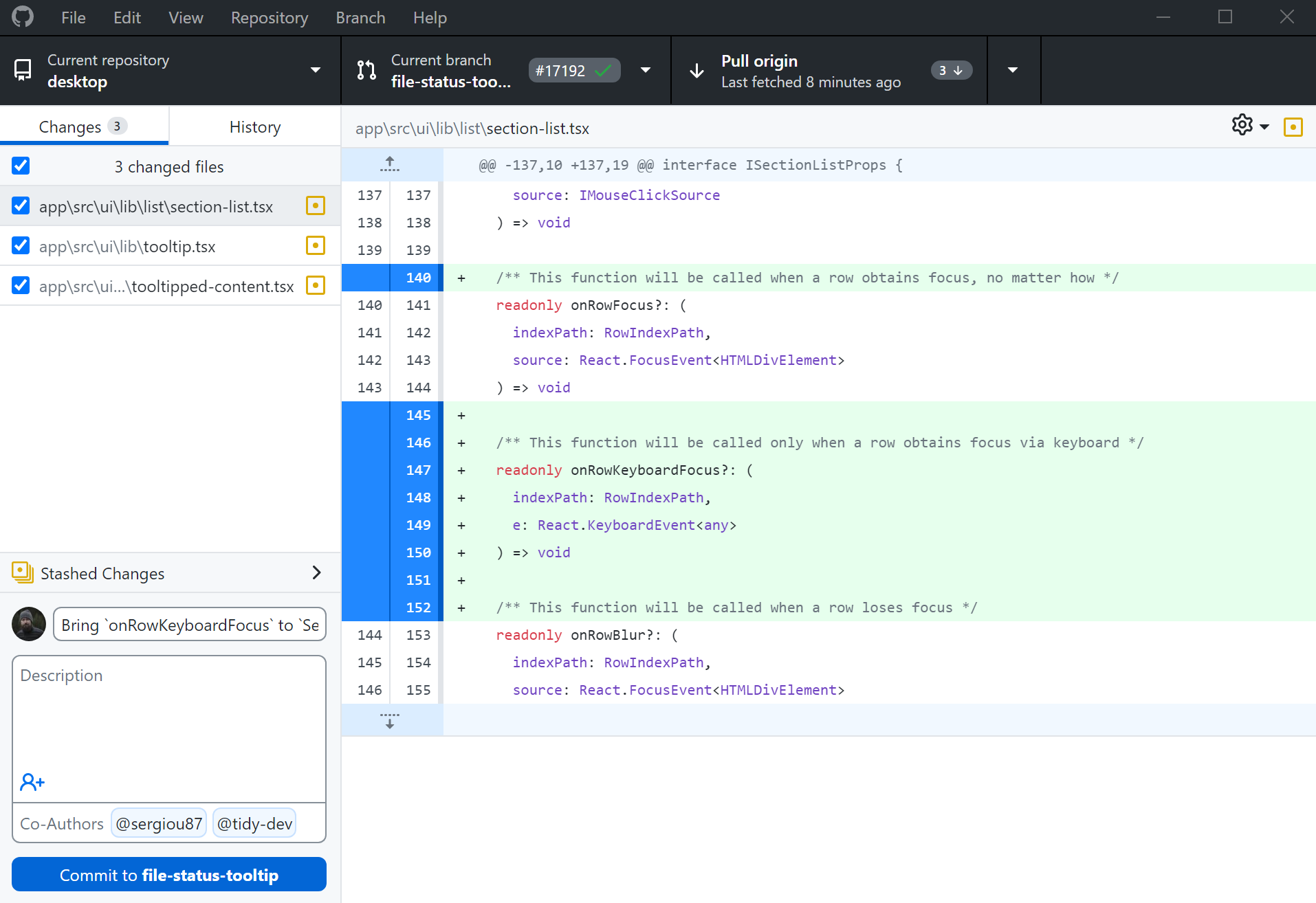  A screenshot of the GitHub Desktop application showing changes being viewed and committed with two attributed co-authors